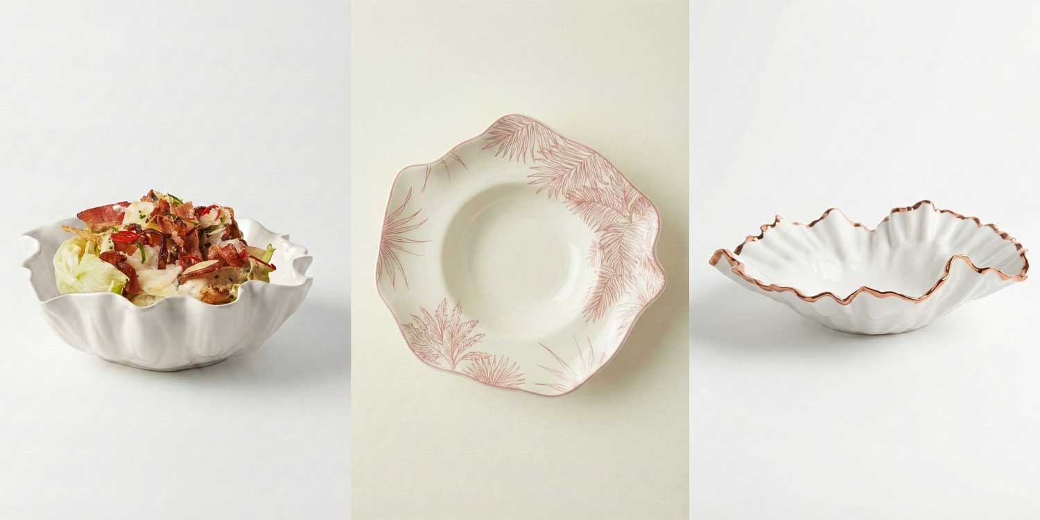 Scalloped white porcelain bowls with pink and gold rims, bespoke tableware for restaurants