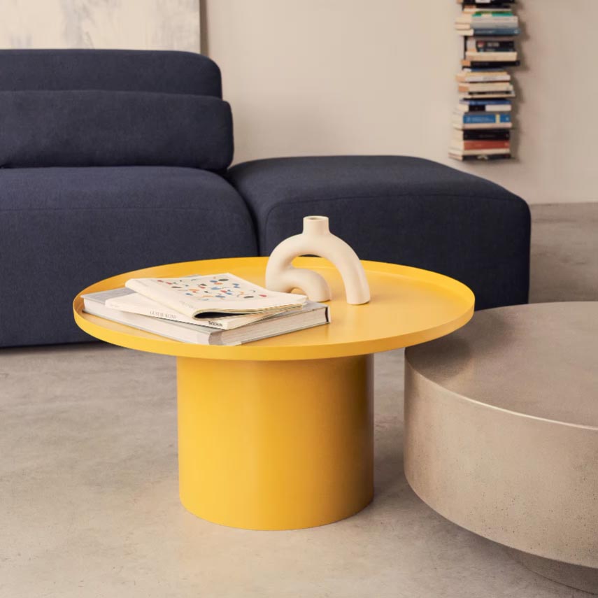 Cadmium Yellow round coffee table in a living room, a mood reference for the glaze colour