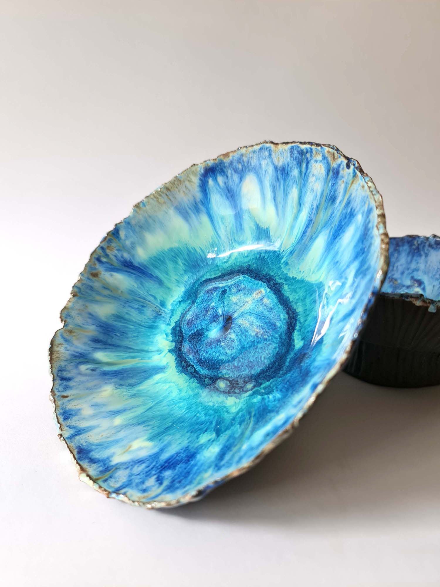Handmade porcelain bowl in swirling turquoise and blue reactive glaze made for chef Bruno Verjus