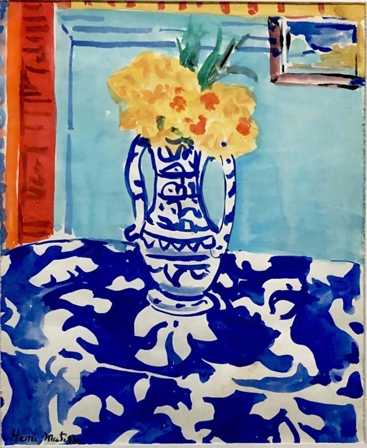 Matisse still life painting with a blue patterned vase of yellow flowers on a blue cloth