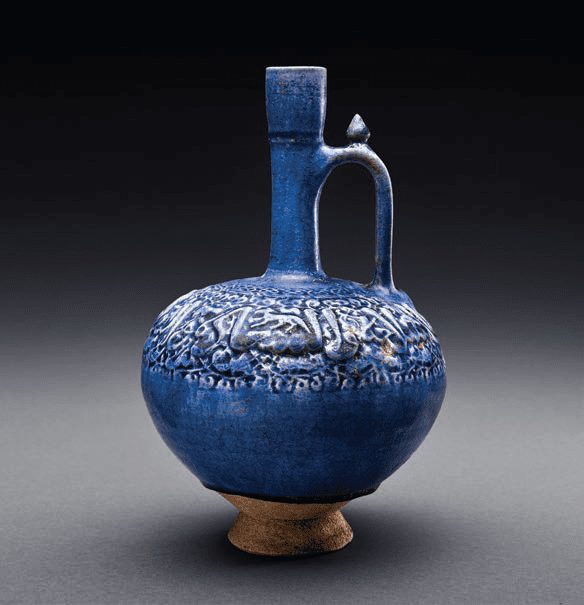 Historic cobalt blue glazed ceramic jug with relief decoration, inspiration for the Royal Blue glaze